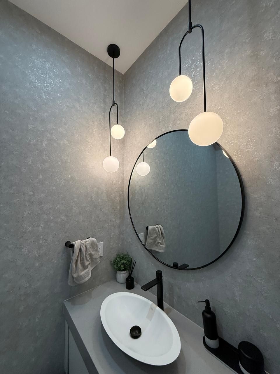 Luxury vanity with custom globe pendant lighting
